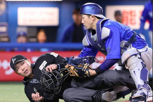 Japan baseball umpire hit by bat still unconscious two weeks on