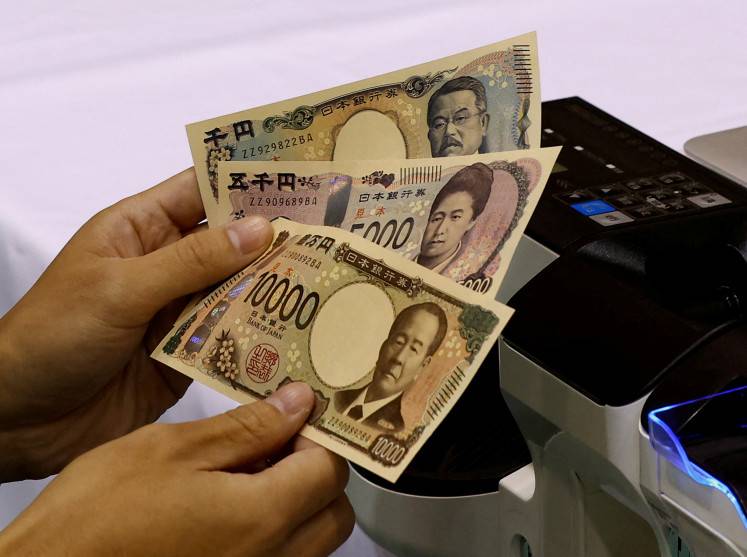 Japan spends more than $30 billion to prop up yen