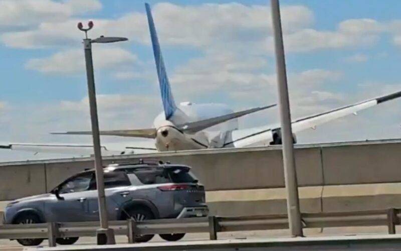 Passenger jet clips lamppost, truck while landing at US airport