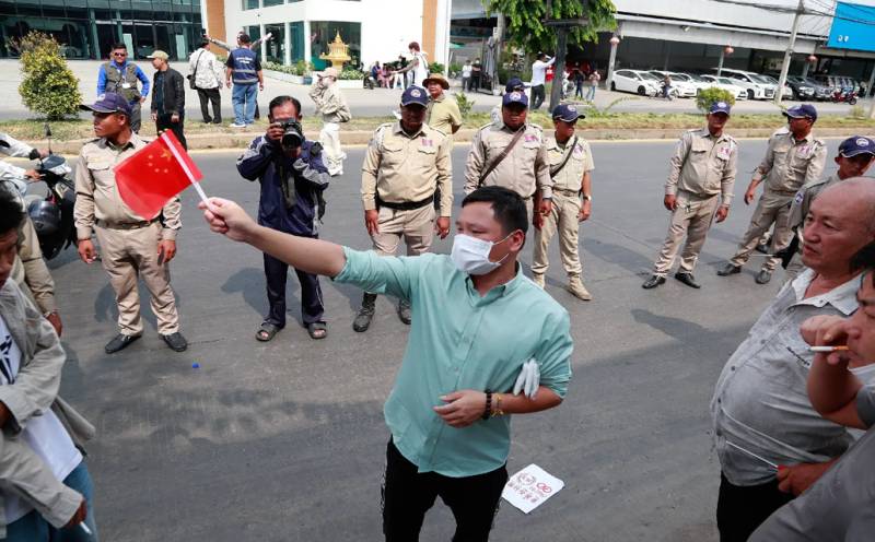 Cambodian PM's cousin says owned 30% of scam-linked firm