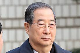 South Korea ex-PM's martial law sentence cut to 15 years on appeal