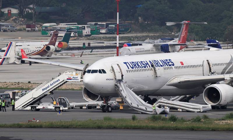 Turkish Airlines plane evacuated after landing gear fire in Nepal