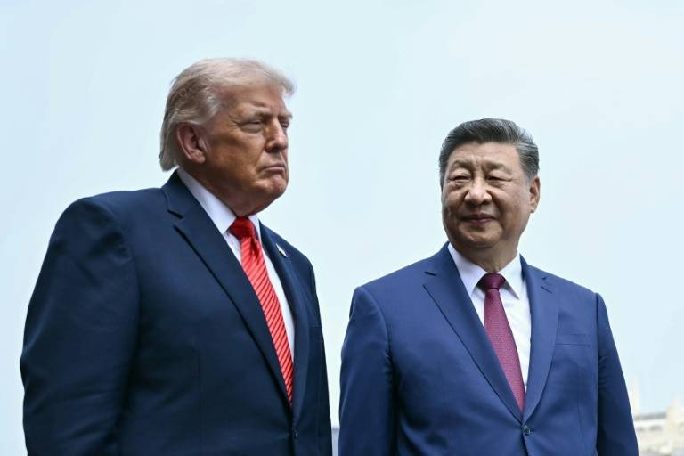Subdued Trump left waiting for 'big hug' from Xi
