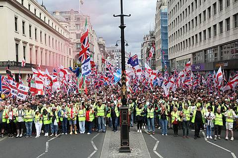 Tens of thousands turn out for UK far-right rally, counter demo