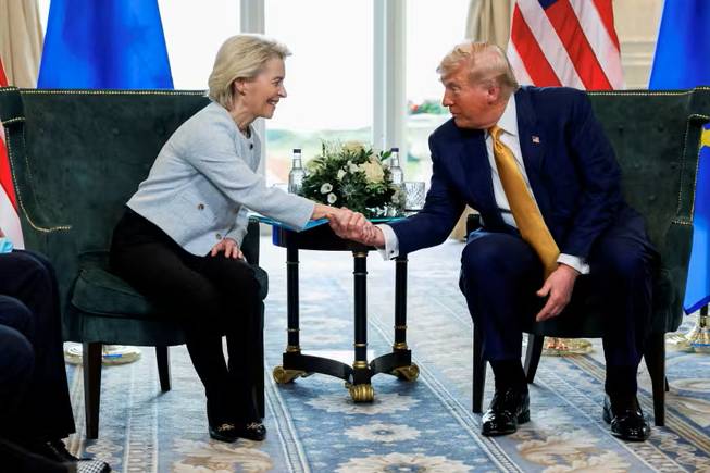 EU agrees to implement US trade pact after Trump threats