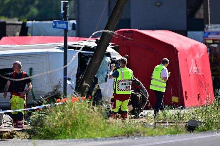 Four dead after train hits school bus in Belgium