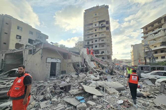 Israel says US backs striking Beirut suburbs if Hezbollah attacks