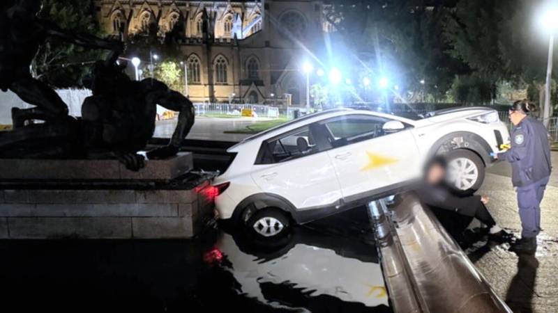 Frenchman eating McDonald's crashes into historic Sydney fountain, police say