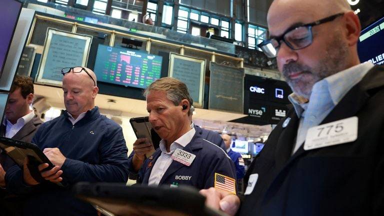 Oil drops, stocks mostly higher despite AI concerns