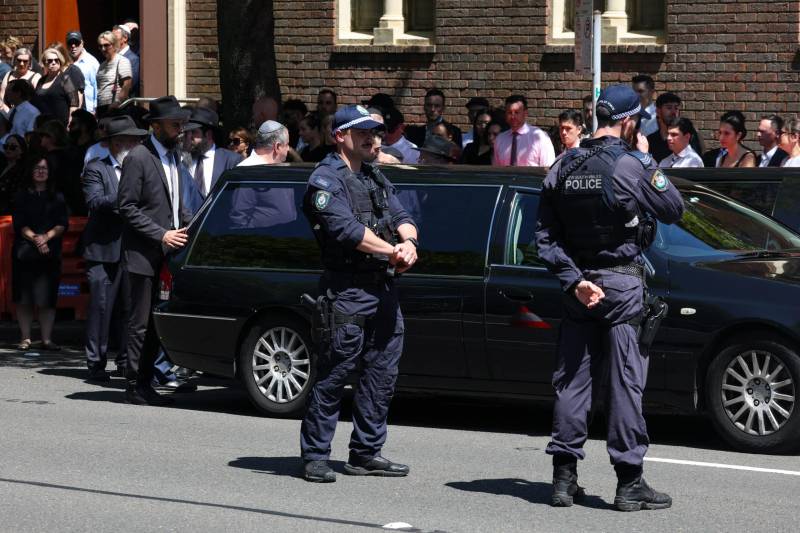 Sydney police hunt gunman who opened fire on funeral venue