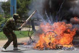 Kenyan police fire tear gas, make arrests at US Ebola centre protest