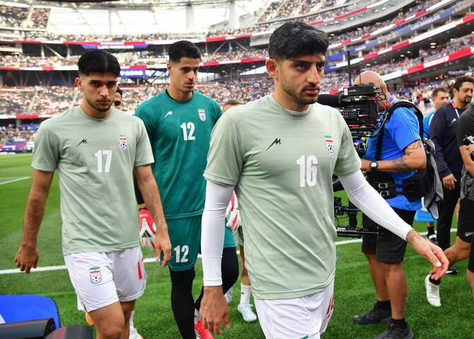 Iran says footballer's US visa expires after World Cup opener