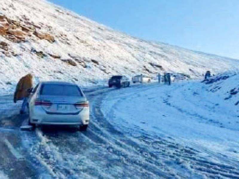Tourist rush grows as Babusar Top receives unexpected snowfall in summer
