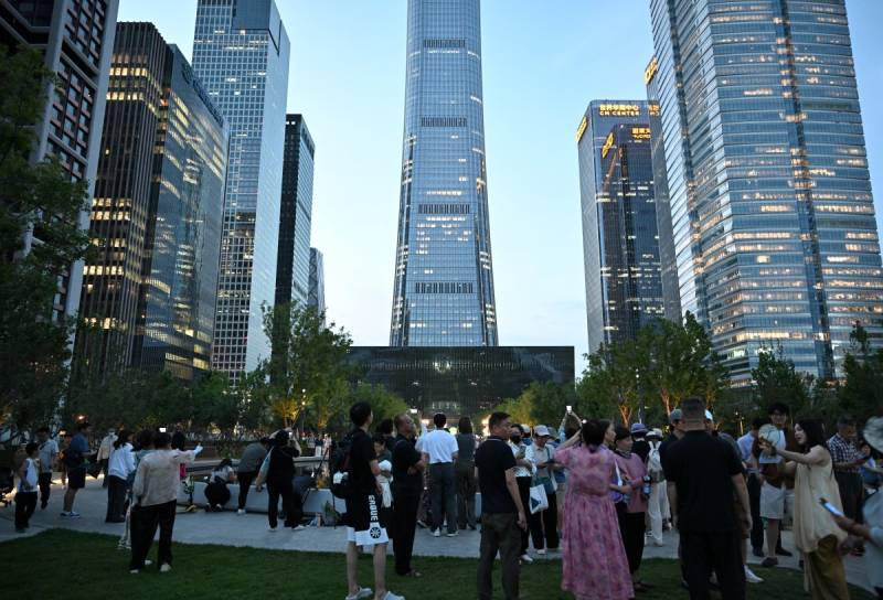 Plane debris seen at Beijing's tallest building: witness