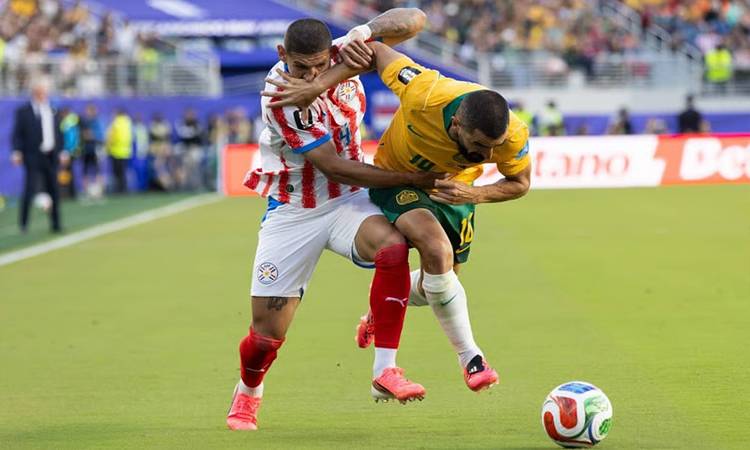Australia draw with Paraguay to clinch World Cup last 32 place