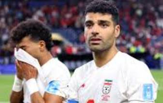Algeria, Austria draw to advance in World Cup, Iran eliminated