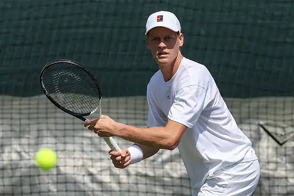Bloodied but unbowed: Sinner avoids shock exit at start of Wimbledon title defence