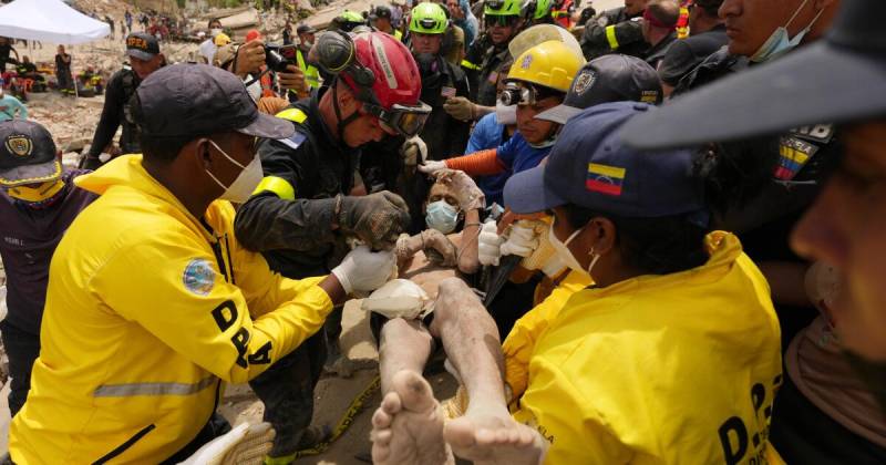 Man, teen son rescued four days after Venezuela quakes