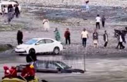 Police in Naran arrest four tourists for driving their car through river 