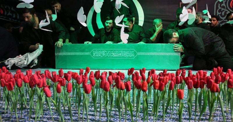 Iran leaders pay last respects to Khamenei as mourners gather