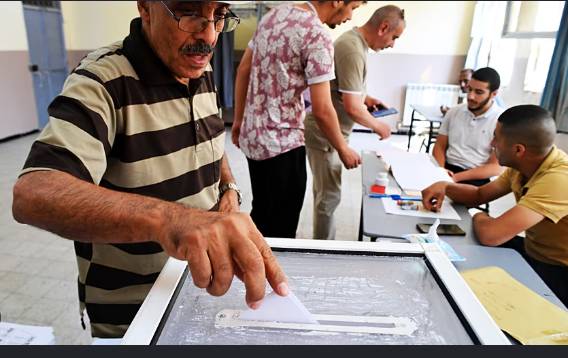 Algerians vote for new parliament, turnout projects record low