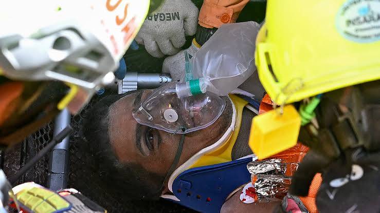 Rescuers dig out Venezuelan man eight days after quakes