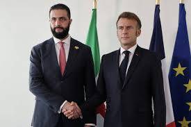 Syria says expecting visit by French President Macron