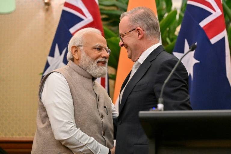 Modi visits Australia for minerals talks and rockstar welcome