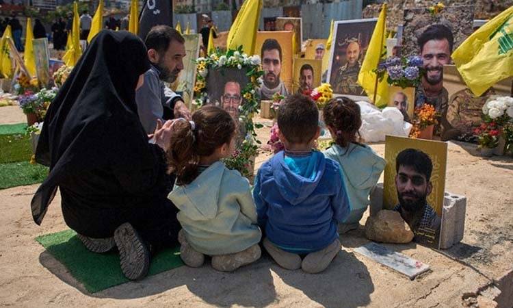 Hezbollah buries dozens of fighters in south Lebanon