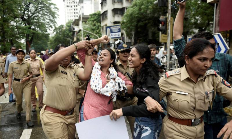 Indian police fire tear gas at exam protest march