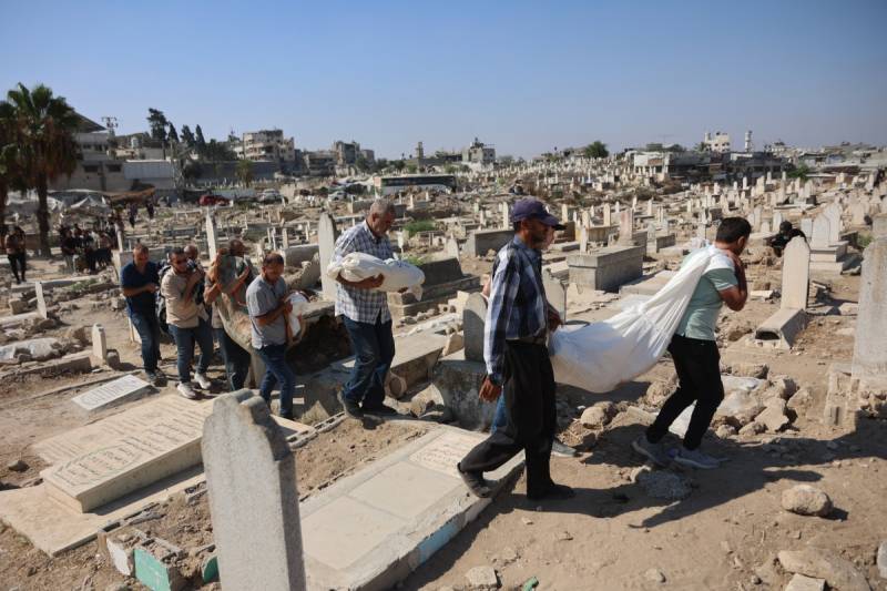Gaza civil defence says Israeli strikes kill 12, including family of six