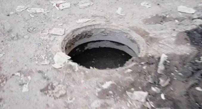 Open manhole claims life of another boy in Karachi