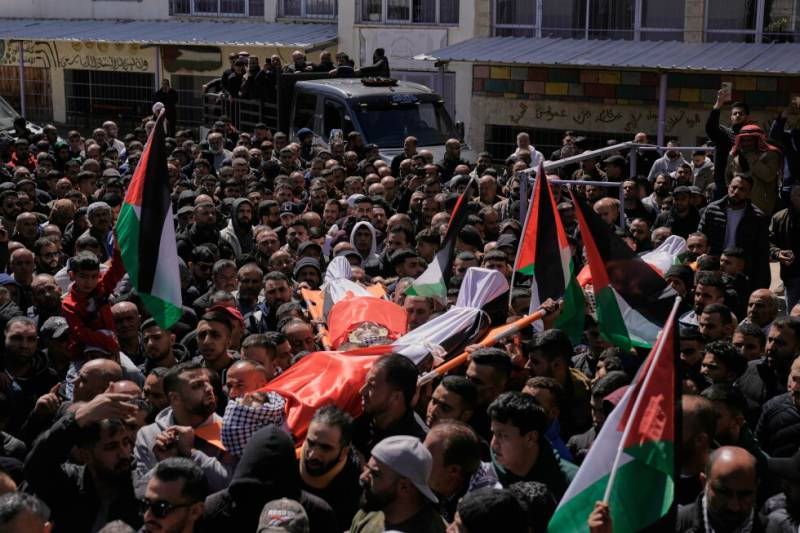 Palestinians bury four killed in West Bank clash with Israeli settlers