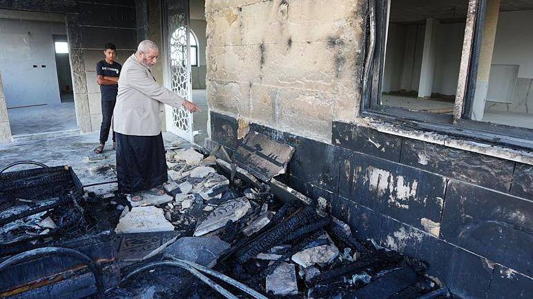Palestinian officials say Israeli settlers torch 2 mosques in West Bank
