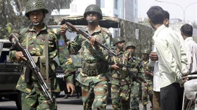 Bangladesh detains senior army officer in staged killing case