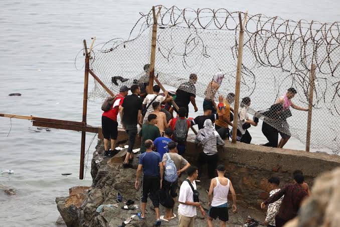 EU races to contain new migrant crisis as thousands cross into Spain's N. Africa enclave