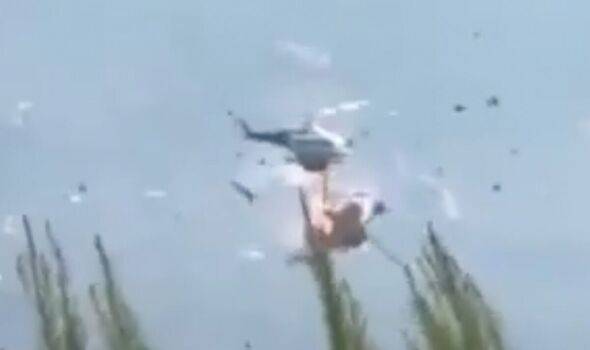 Helicopters collide in Greece as fires spread