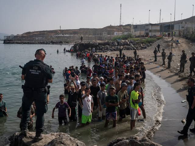 Spain defends Ceuta sovereignty after Moroccan migrant rush