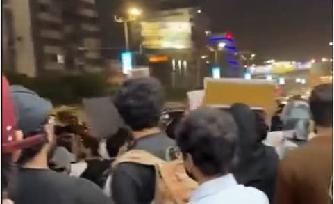 Mir Raza's friends hold late-night sit-in on Karachi's Shahrah-e-Faisal