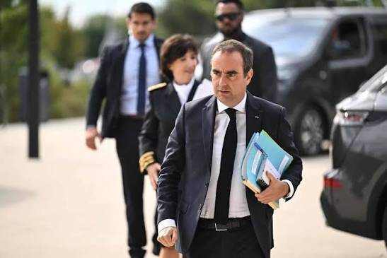 French PM announces help for fire-hit regions after jeers from locals