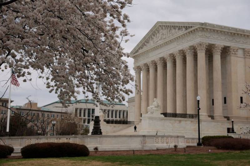 Top court upholds Trump bid to curb mail-in ballots for now