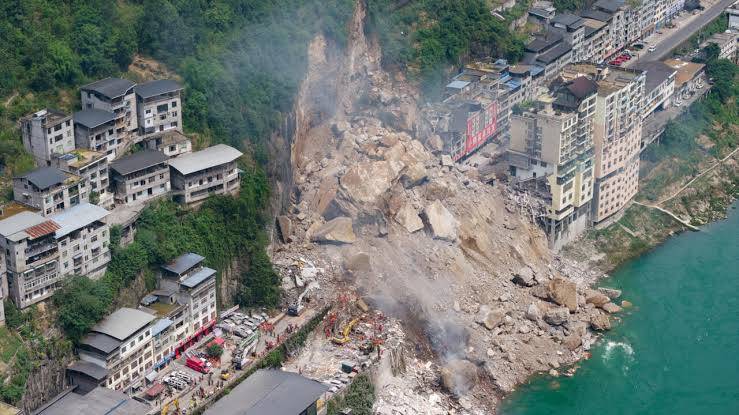 Landslides in China kill six, nine missing