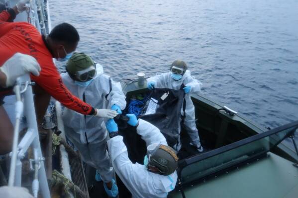 First bodies of Philippines ferry fire victims land as toll hits 35