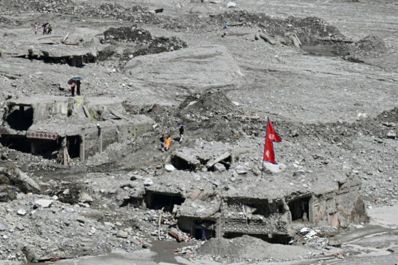 Thousands missing, aid needs mount one month after Nepal's deadly floods