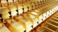 Gold prices edge lower in global, local markets