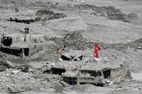 Thousands missing, aid needs mount one month after Nepal's deadly floods