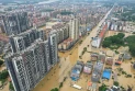 Southern China storms kill four, force mass evacuations